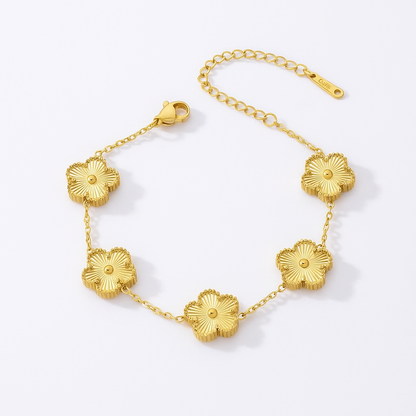 Гривна във формата на детелина в златно. Изработени от неръждаема стомана на достъпна цена.