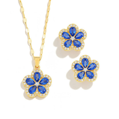 Колие и обеци във формата на детелина с син камък и циркони и златно покритие